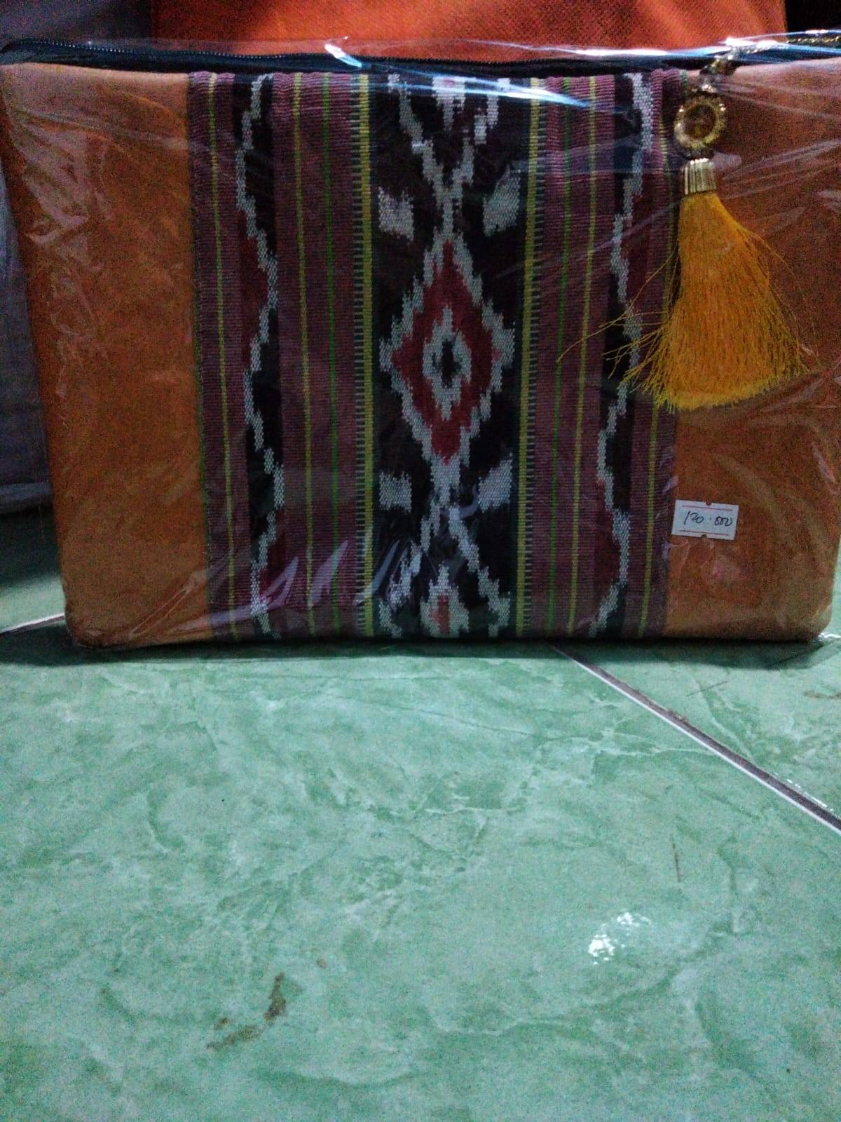 tas samping motif